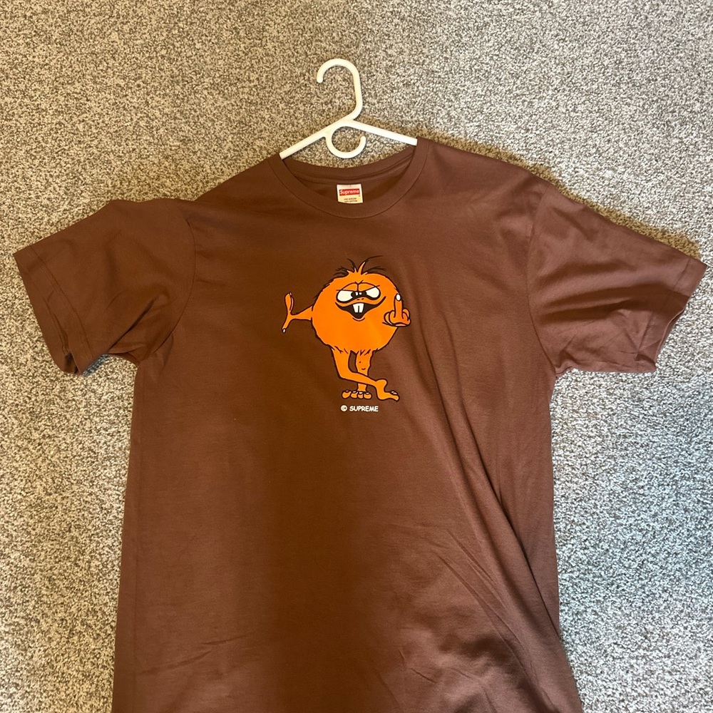 Supreme Brown Tee with Orange Cartoon Graphic
